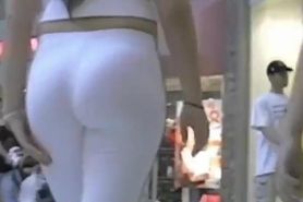 Tall and thick lady with an XL ass in sweats being tailed a by spy cam