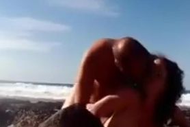 Amateur couple having sex at the beach