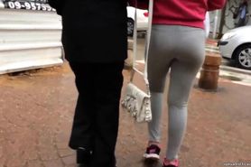 bubble butt in grey yoga pants walking the street