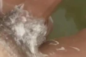 Guy wash his long dick