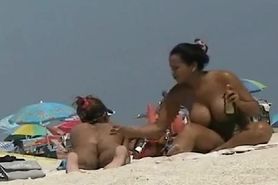 Sexy babes filmed playing on the beach