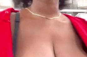 Caught flashing those black tits