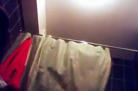 23 yo brunette with 34DD tits caught by spycam in shower