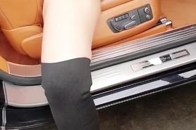 Wife in car rubbing her wet pussy