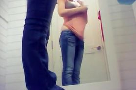 Cutie in tight blue jeans and off on changing room video
