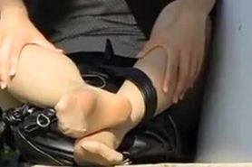 nylon soles feet at the park in tokyo