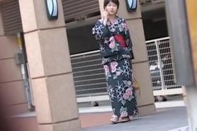Black-haired small geisha flashes her boobs when someone pulls her outfit