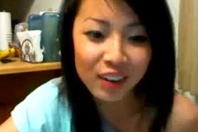 Asian cutie teases on a webcam