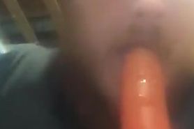 Fat guy sucking on dildo