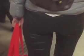Nice blonde's ass in black pants