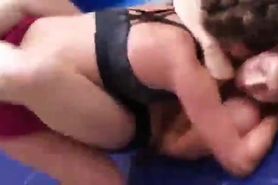 Wrestling girls on the mat scissors