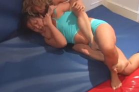Wrestling girls battle on the mat