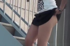 Asian girl pees outside