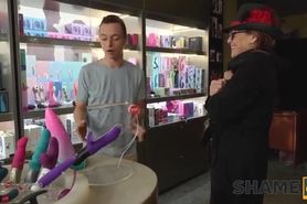 Sinful GILF Melissa Johnson is fucked in the sex shop