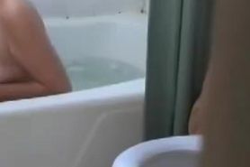 Hot milf is caught by spy cam as she takes a bath