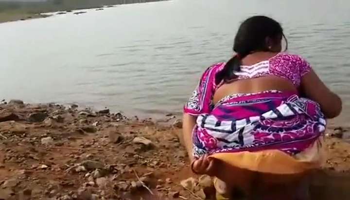 Indian Hairy Pussies Peeing - Indian woman peeing in the dirt by a lake - Tnaflix.com