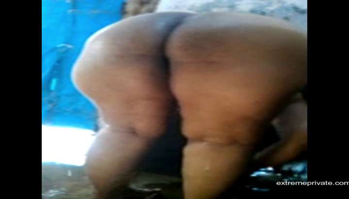 Indian Big Butt Porn - Peeking at the big butt Indian Aunty - Tnaflix.com