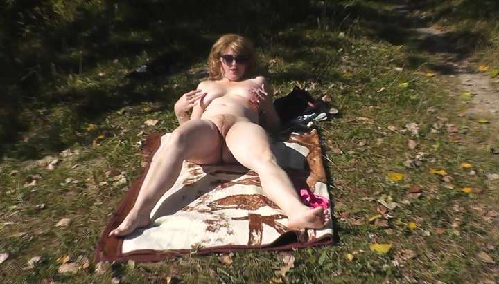 Naked wife Milf masturbates by river in nature