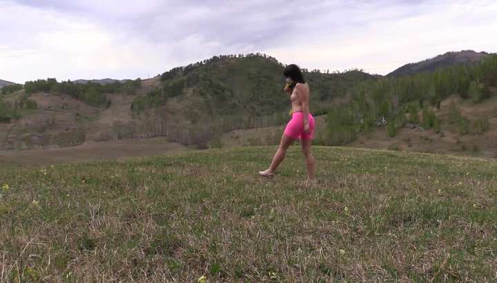 Nudist with a big ass and hairy pussy runs outdoors. Exhibitionism TNAFlix  Porn Videos