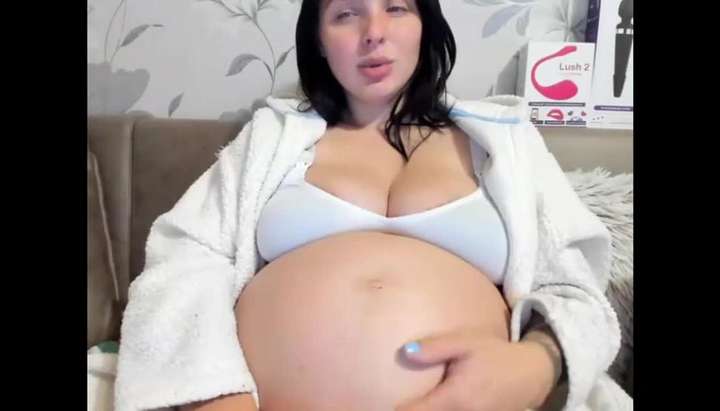 Preggo Mama with HUGE Baby Bump Rubbing Belly on Cam - Tnaflix.com