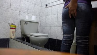 Chubby woman caught on a voyeur camera in the bathroom