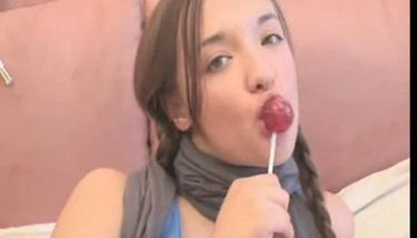Asian Teen With Lollipop