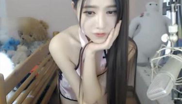 Asian with nice tits plays using toy in pussy