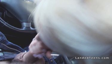 Blonde with red lips sucks cock in car