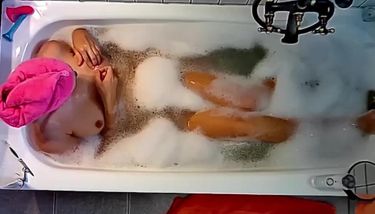 My cute mom masturbates in bath tube. Hidden cam