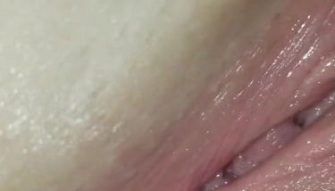 Homemade close-up video of a blue vibrator in a pink pussy